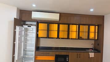 Deluxe Apartment, 2 Bedrooms | Private kitchenette | Full-size fridge, microwave, oven, toaster oven