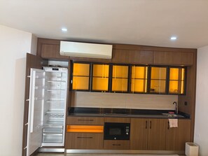 Deluxe Apartment, 2 Bedrooms | Private kitchenette | Full-size fridge, microwave, oven, toaster oven