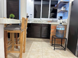 Fridge, stovetop, coffee/tea maker, toaster