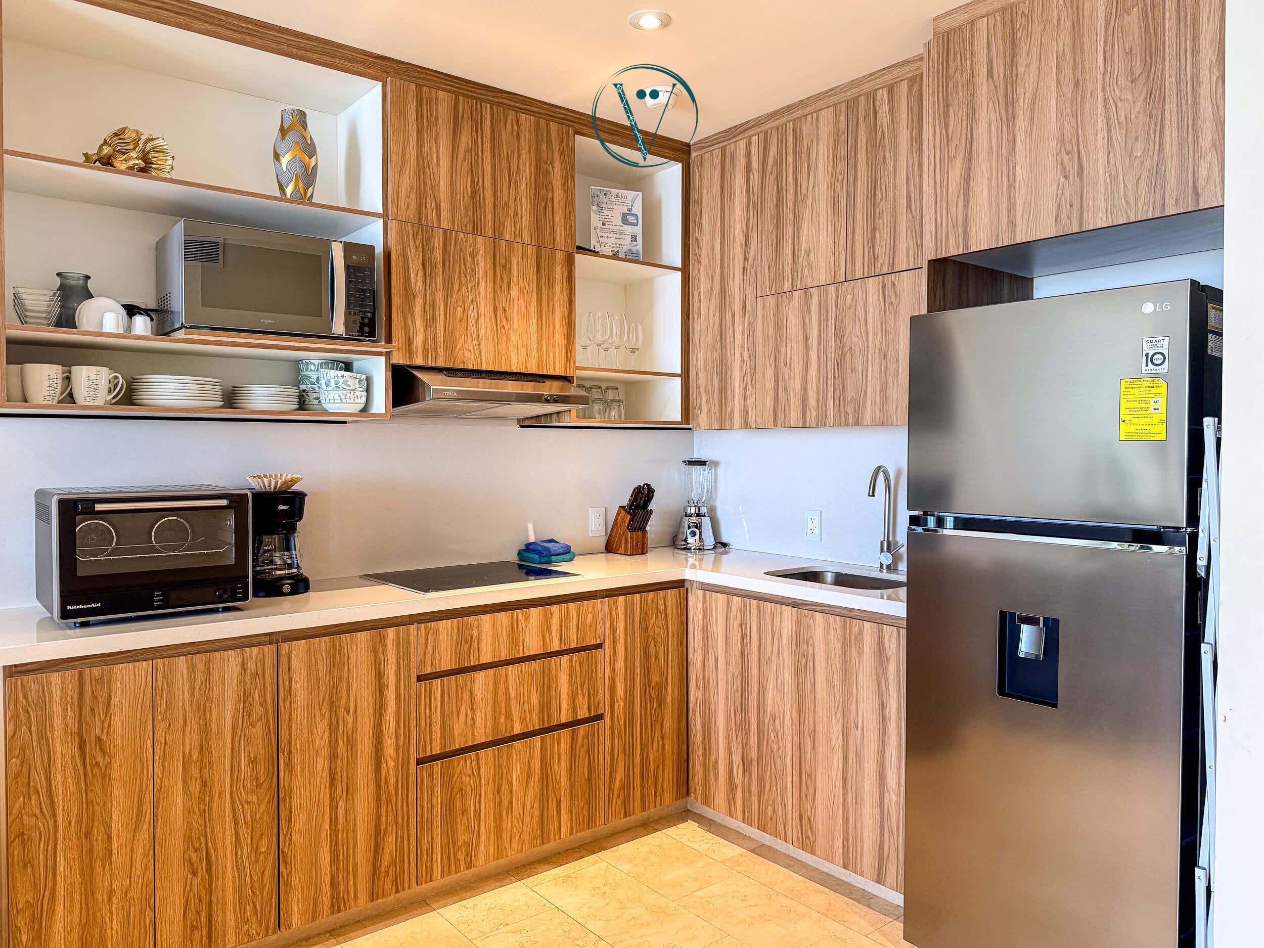 Fridge, microwave, stovetop, coffee/tea maker