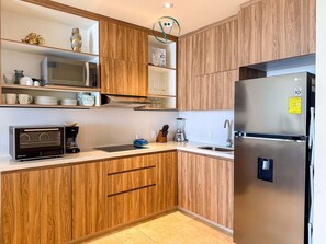 Fridge, microwave, stovetop, coffee/tea maker