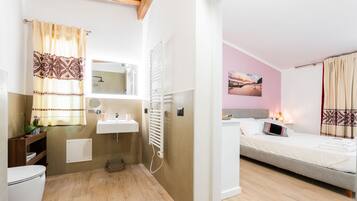 Shower, free toiletries, hair dryer, towels