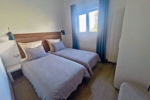 2 chambres, fer et planche à repasser, Wi-Fi, draps fournis