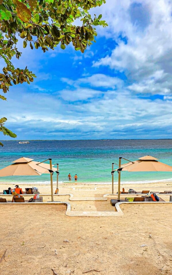 Private beach nearby, white sand