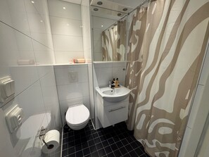 Douche, sèche-cheveux