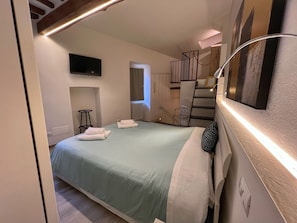 1 dormitori, planxa i posts de planxar, wifi gratuïta i roba de llit