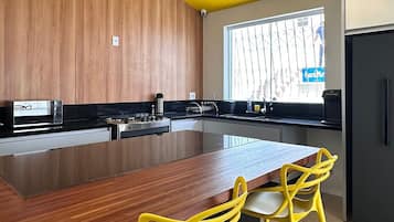 Fridge, microwave, stovetop, cookware/dishes/utensils