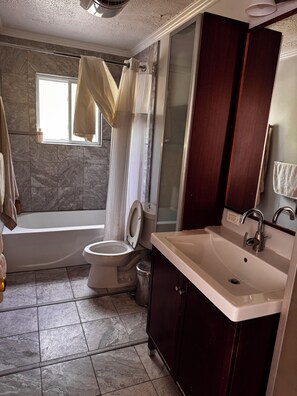 Shower, towels, soap, shampoo