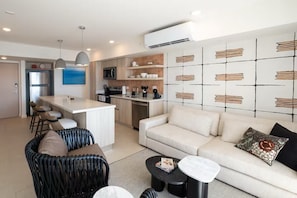 Deluxe Apartment, Balcony, Beach View | Living area