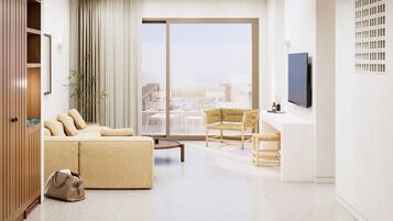 Executive Suite Sea View | Brankas, tirai kedap cahaya, dan Wi-Fi gratis