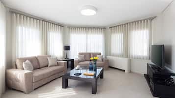 Exclusive Apartment, Balcony, City View | Living area | Computer monitors, printers