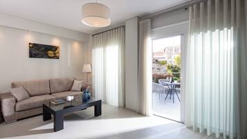 Superior Apartment, Balcony, Garden View | Living area | Computer monitors, printers
