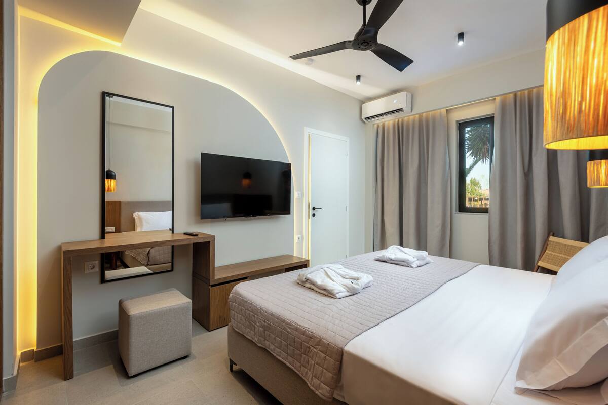 Superior Apartment, Sea View, Ground Floor | In-room safe, laptop workspace, blackout drapes, soundproofing