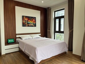 Deluxe Double Room, City View | Desk, blackout drapes, soundproofing, free WiFi