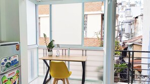 Deluxe Double Room, Kitchen, City View | Desk, iron/ironing board, free WiFi