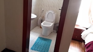 Shower, free toiletries, slippers, towels