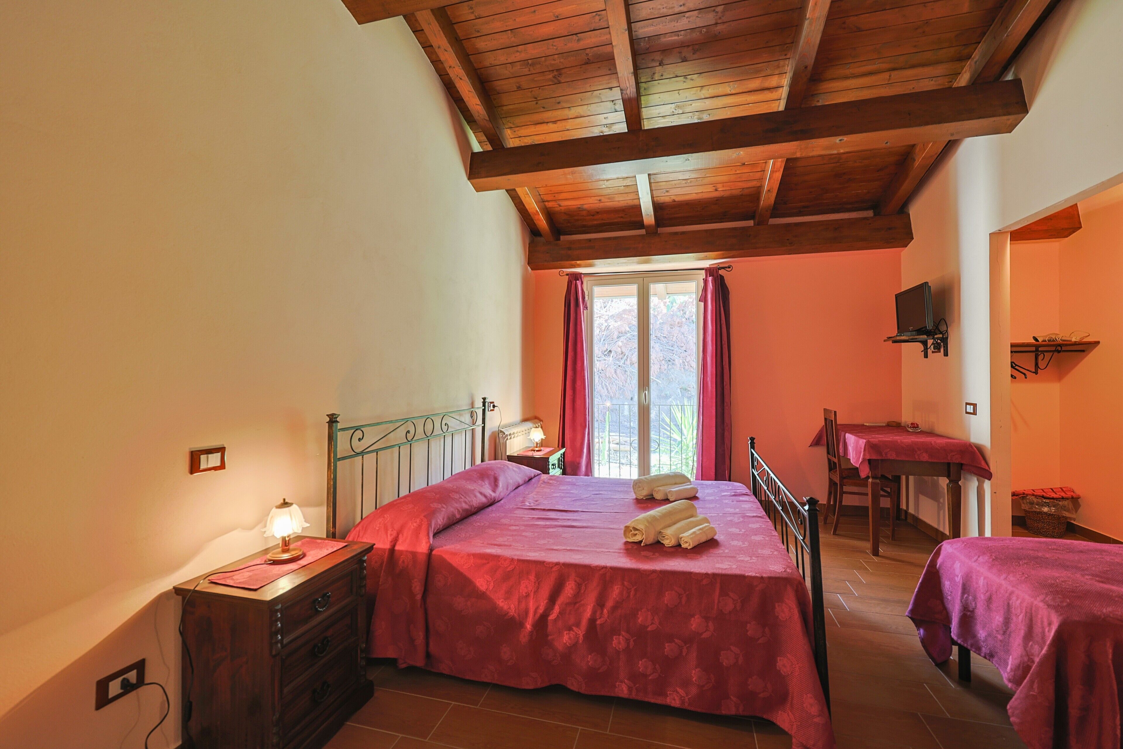 1 bedroom, desk, bed sheets