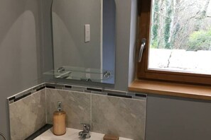 Shower, eco-friendly toiletries, hair dryer, towels