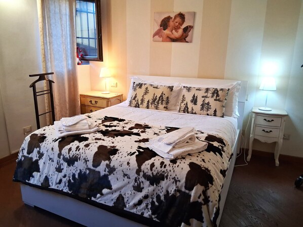 1 bedroom, desk, iron/ironing board, travel crib