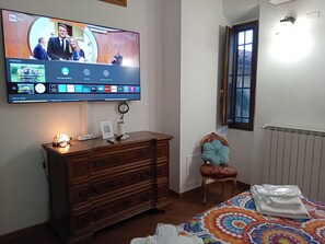 1 bedroom, desk, iron/ironing board, travel cot