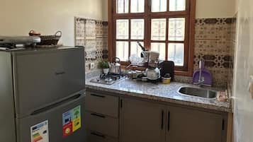 Monolocale Deluxe, balcone, vista montagna | Cucina privata | Macchina per caffè espresso, bollitore elettrico