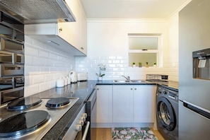 Apartment, 2 Double Beds, Pool Access, Ocean View (Villa Italia) | Private kitchen | Fridge, microwave, oven, stovetop