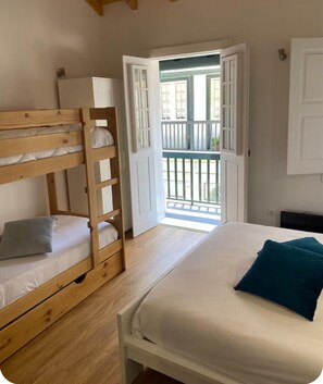 Family Apartment, Balcony, City View | Blackout curtains, soundproofing, iron/ironing board, free WiFi