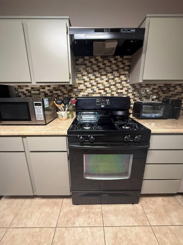 Fridge, microwave, oven, stovetop