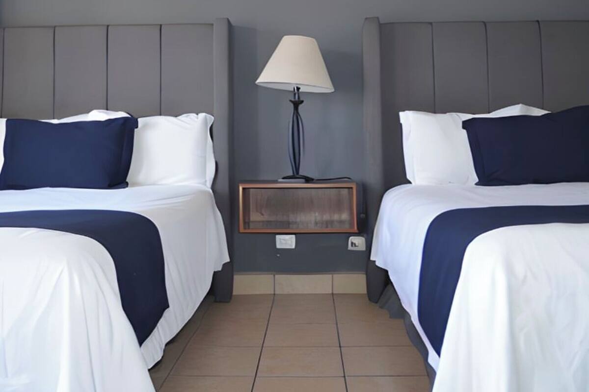 Standard Quadruple Room | Desk, laptop workspace, free WiFi