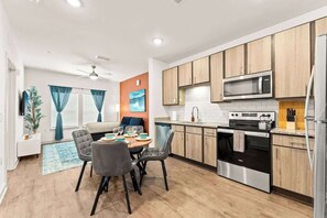 Coffee/tea maker, fridge, microwave, oven
