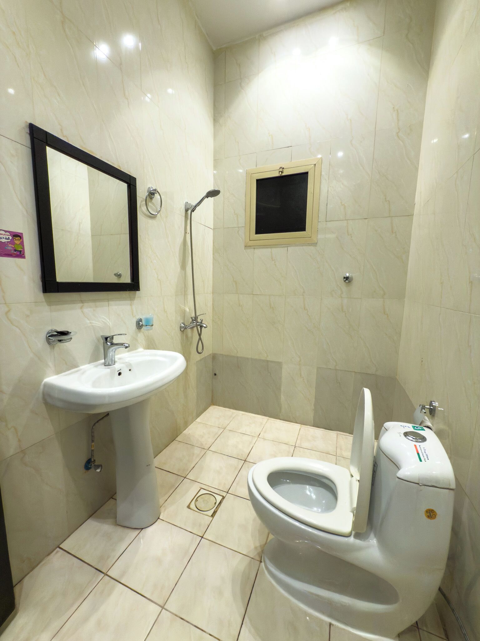 Shower, slippers, towels, soap