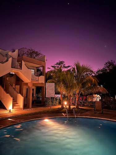 Cozy Condo with Panoramic Hillside Views from Rooftop Terrace and Short Walk to Beach