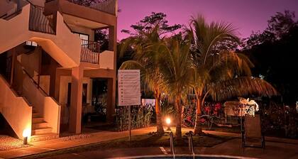 Cozy Condo with Panoramic Hillside Views from Rooftop Terrace and Short Walk to Beach