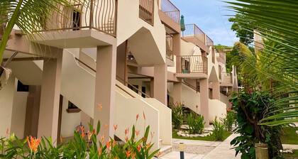 Cozy Condo with Panoramic Hillside Views from Rooftop Terrace and Short Walk to Beach