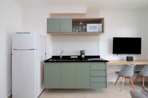 Comfort Apartment | Private kitchen | Full-size fridge, cookware/dishes/utensils