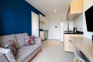 Comfort Apartment | Living area | TV