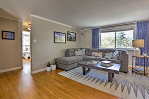 Smart TV, fireplace, books, computer monitors