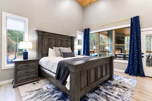 King Suite 1 (1st Floor) with blackout curtains, dresser, TV and nightstands - Kids Play Zones | Hot Tub | 3 Arcades | Family Fun (Broken Bow)
