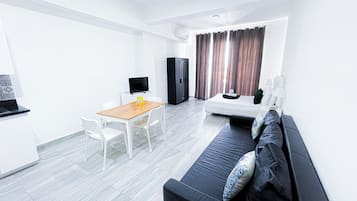 Executive Studio Suite, City View | Individually decorated, individually furnished, desk, iron/ironing board