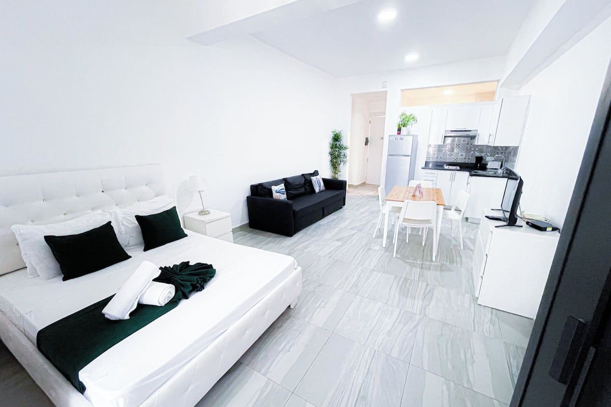 Executive Studio Suite, City View | Individually decorated, individually furnished, desk, iron/ironing board