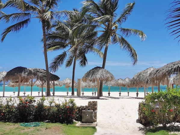 Beach nearby, white sand, sun-loungers, beach umbrellas
