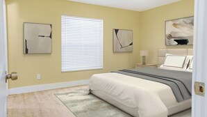 A bedroom with a bed, a nightstand, a lamp, and artwork on the walls. - Zoo House Down Town Tampa (Tampa)