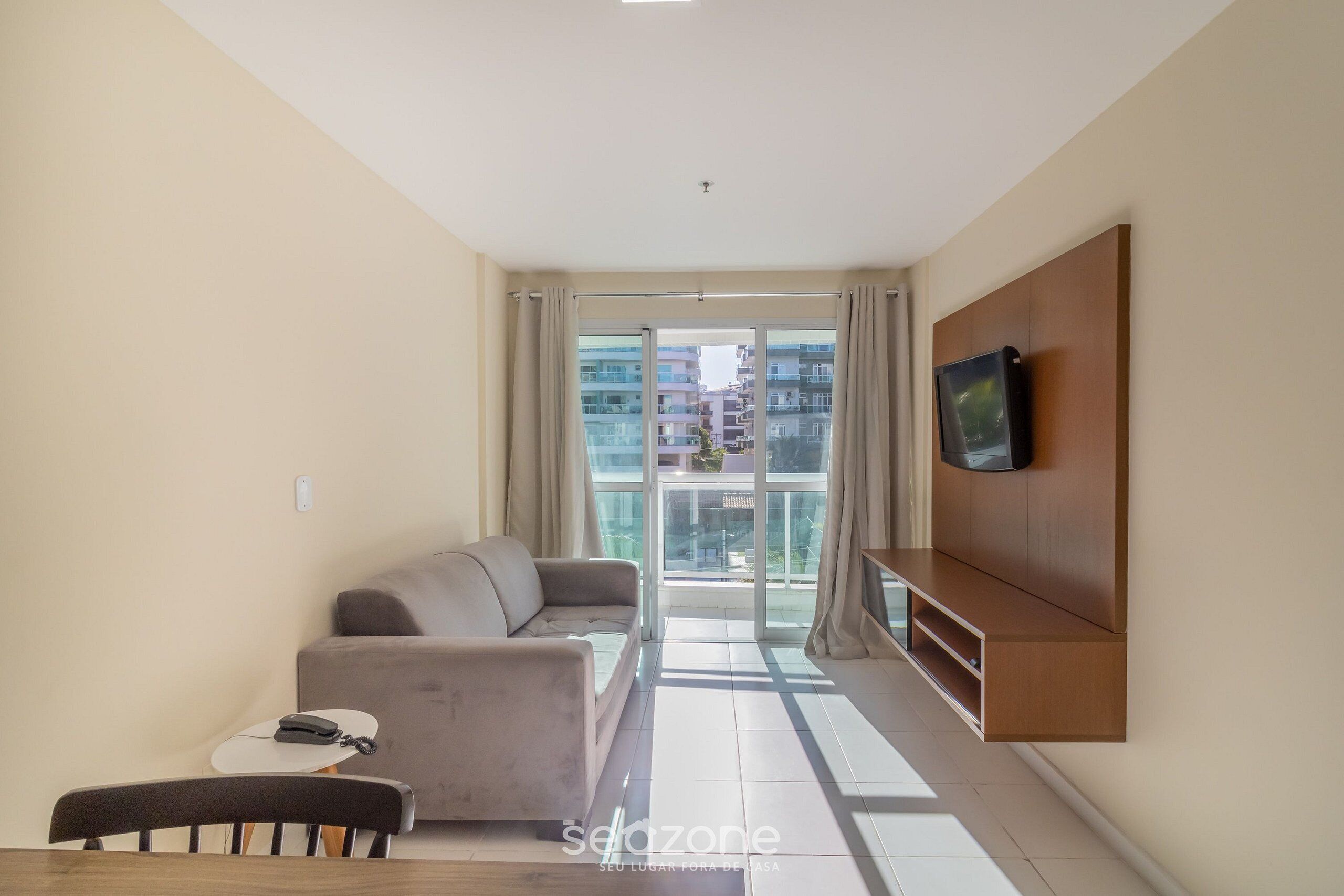 Apartamento básico | Zona de estar | Una televisión