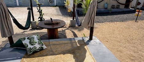 Family Quadruple Room, Garden View | Living area | 32-inch Smart TV with digital channels