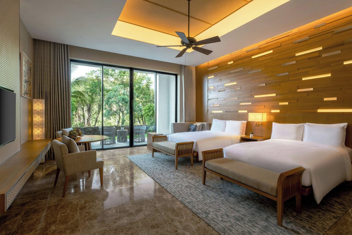Deluxe Room, 2 Double Beds, Non Smoking, Balcony | Minibar, in-room safe, individually decorated, individually furnished