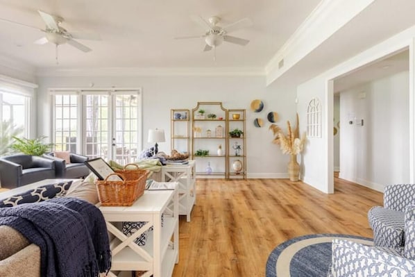 Smart TV, fireplace, books, printers