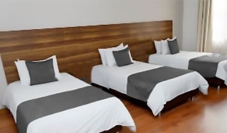 Comfort Triple Room. HOTEL EL PINO SUITE