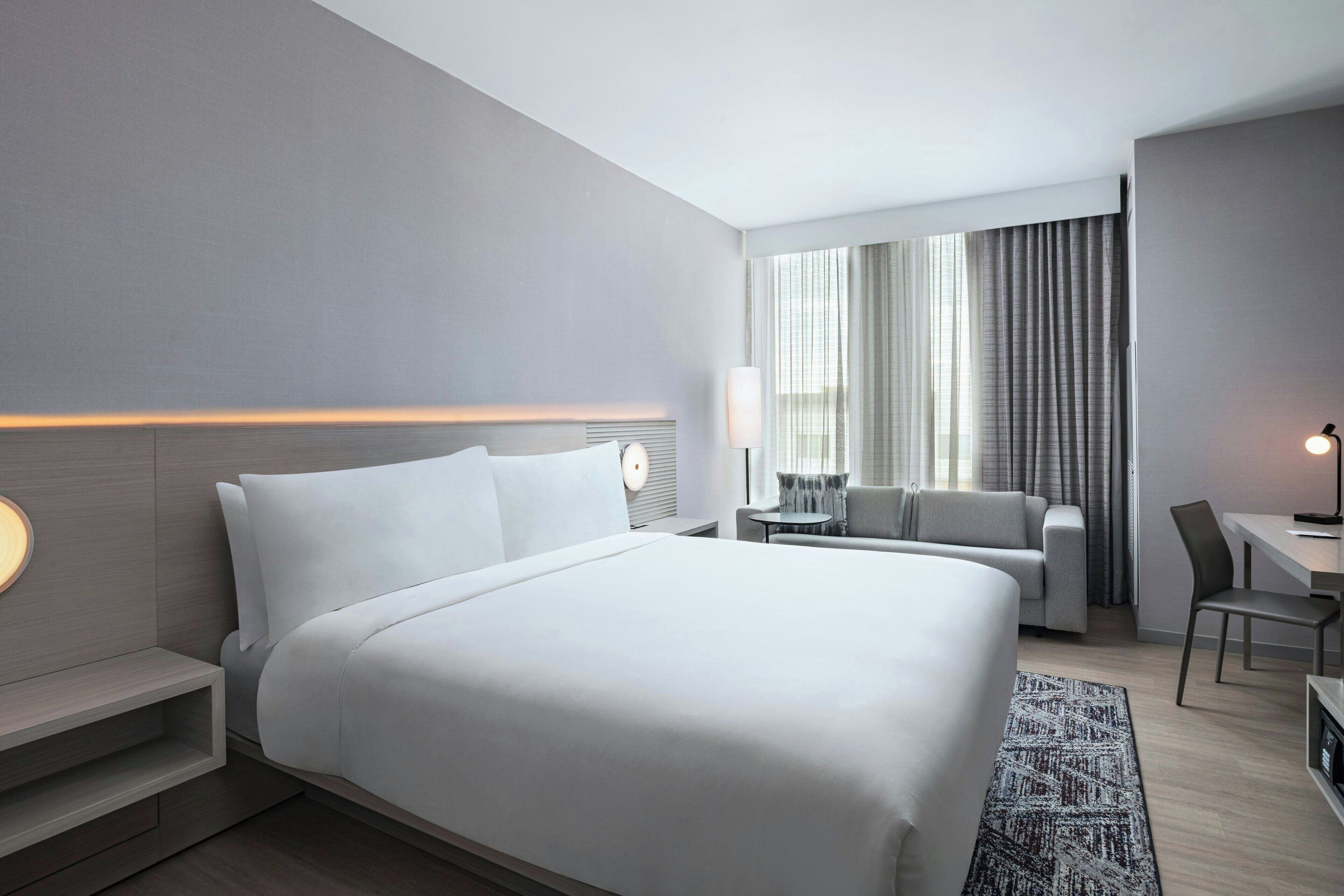 Deluxe Room, 1 King Bed with Sofa bed | In-room safe, desk, laptop workspace, iron/ironing board