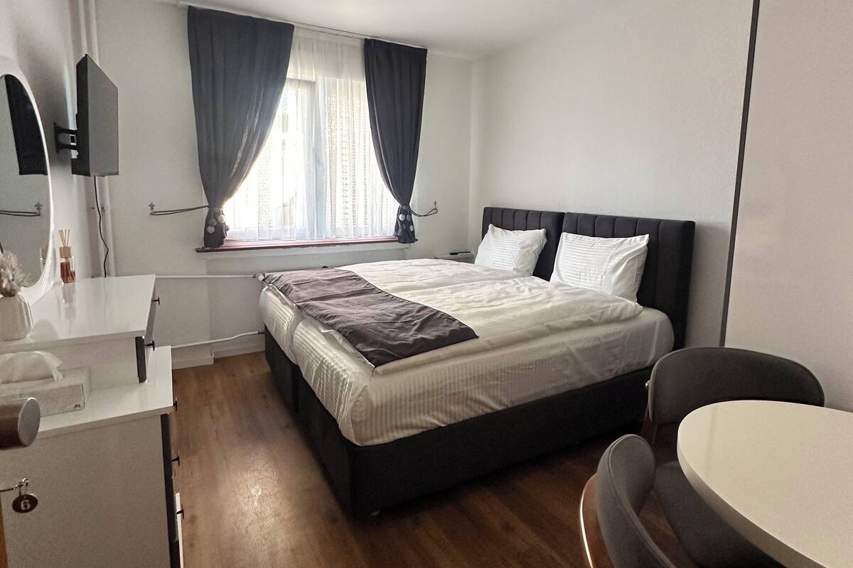 Triple Room, Private Bathroom | Living area