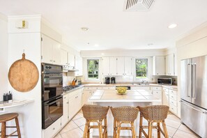 Fridge, microwave, oven, stovetop - Charming Sea Island Cottage • Steps to Beach • Sleeps 10 (Sea Island)